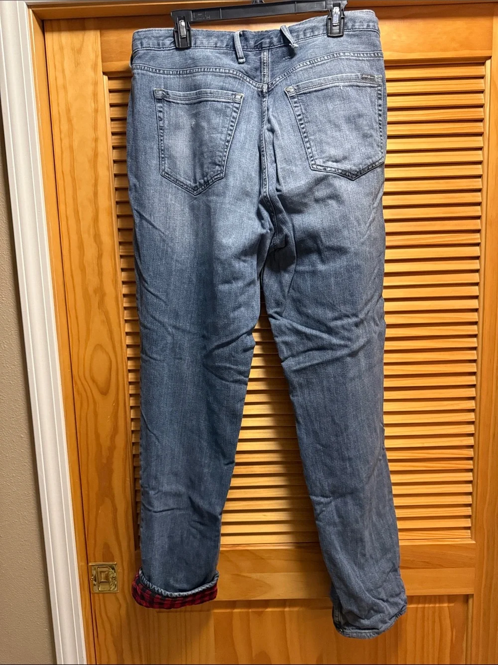 Eddie Bauer Men's Blue Denim Jeans with Red Plaid Lining 40x32 relaxed fit